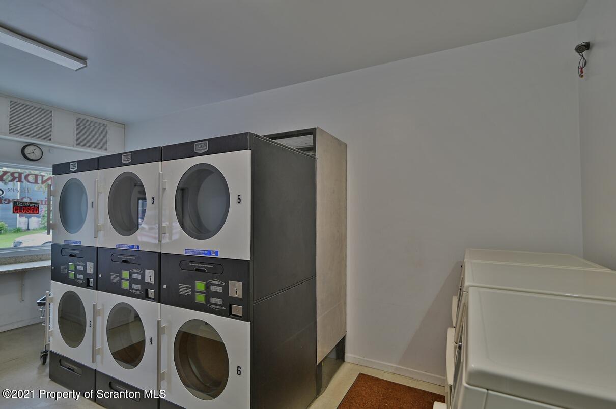 303 Main Street Nicholson, PA 18446 - Photo 36 of 98 a utility room with dryer and washer
