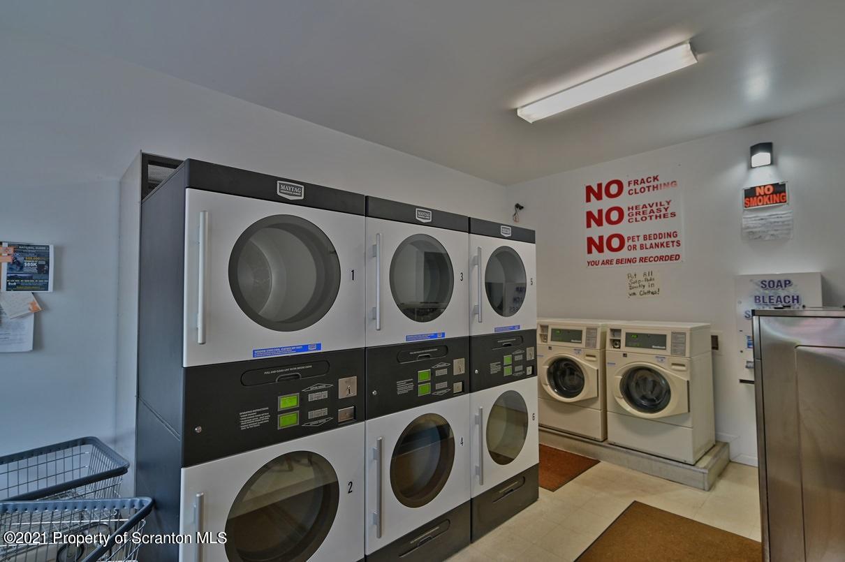 303 Main Street Nicholson, PA 18446 - Photo 37 of 98 a utility room with dryer and washer