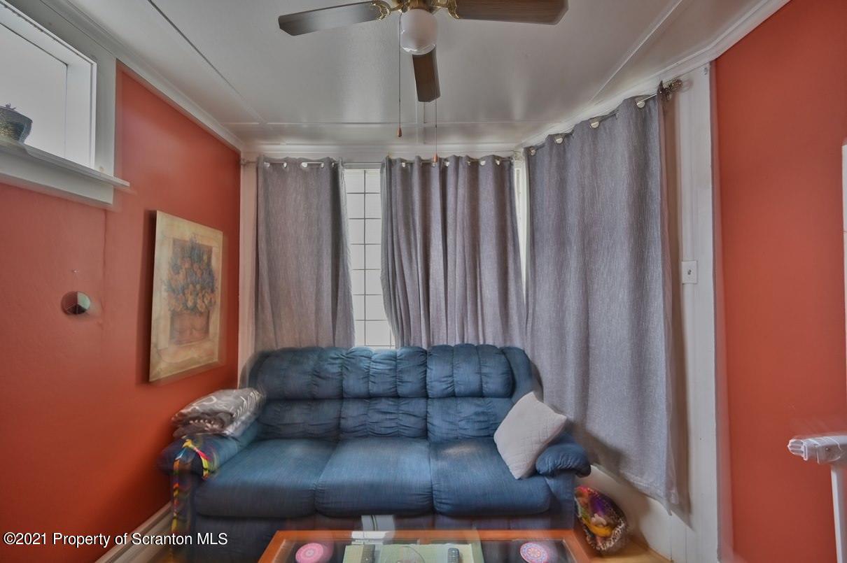 303 Main Street Nicholson, PA 18446 - Photo 52 of 98 a living room with furniture and a rug
