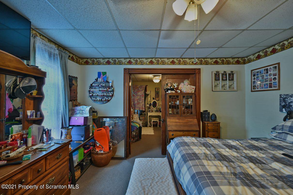 303 Main Street Nicholson, PA 18446 - Photo 63 of 98 a bedroom with bed and walk in closet