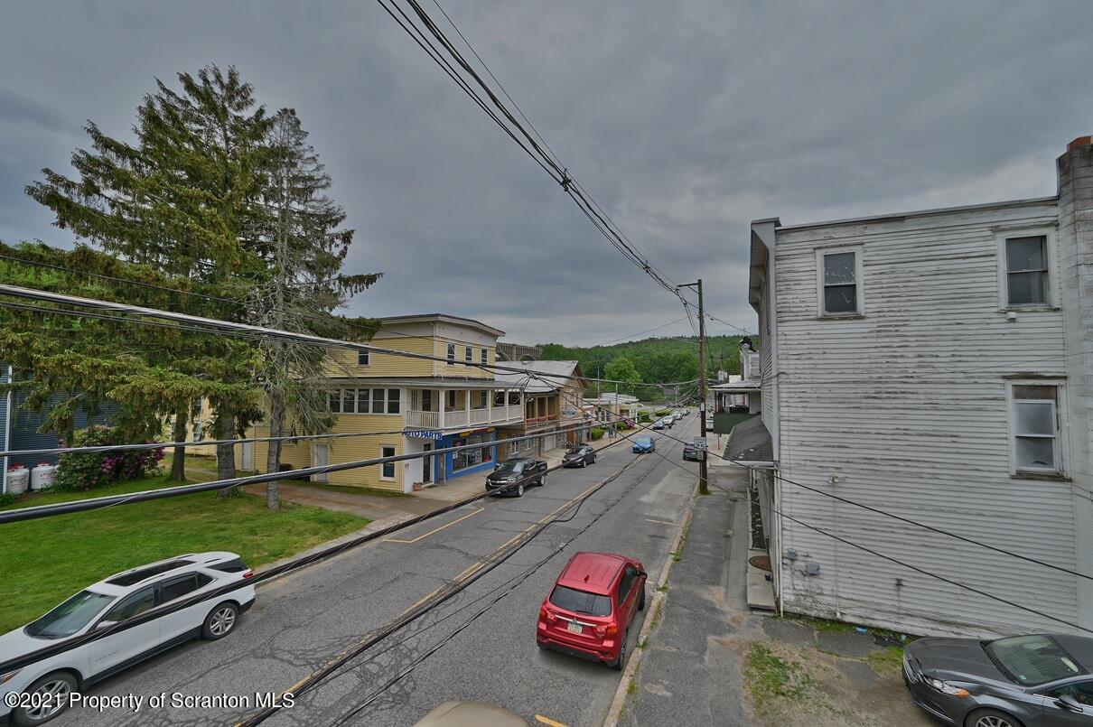 303 Main Street Nicholson, PA 18446 - Photo 67 of 98 a view of a street with cars