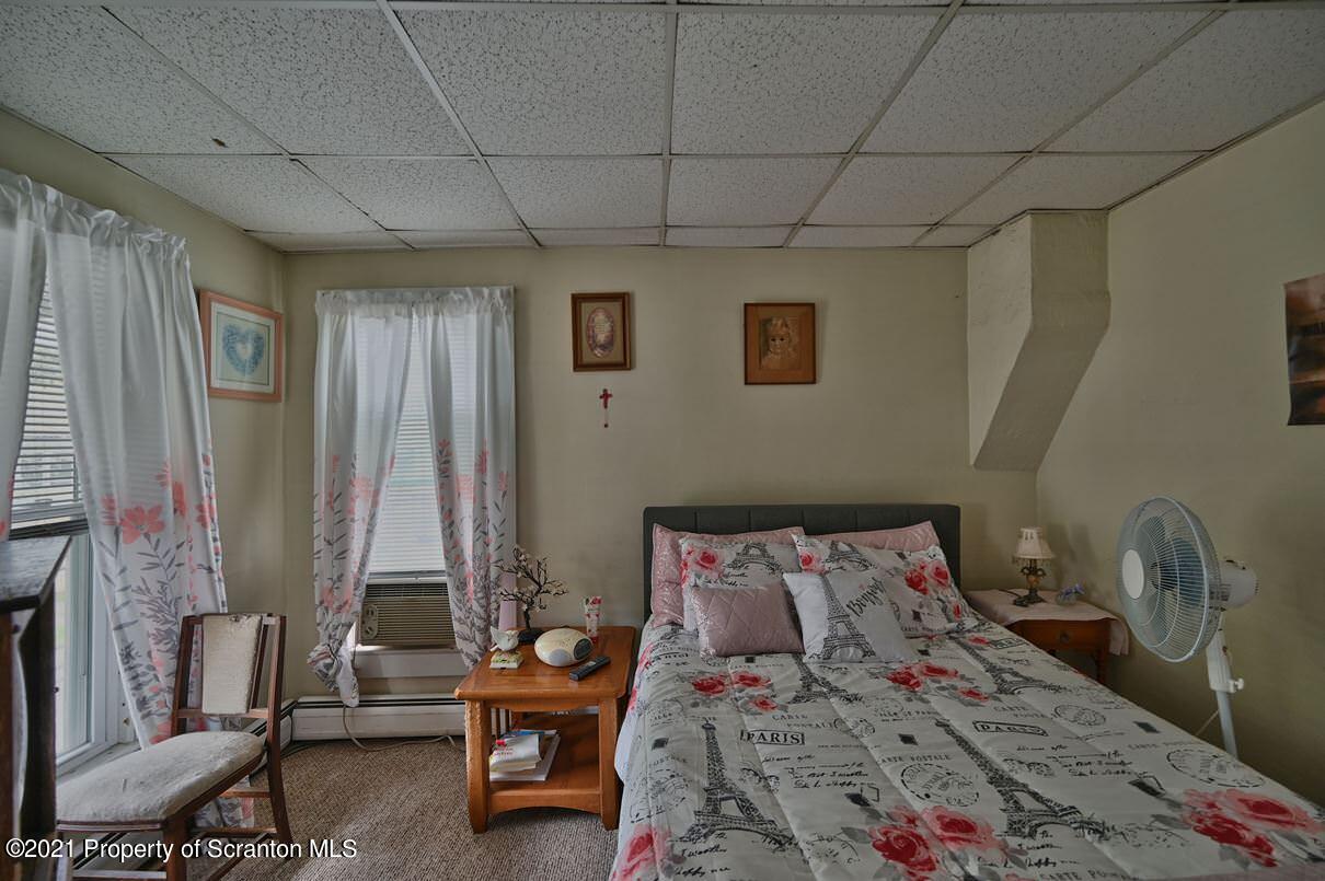 303 Main Street Nicholson, PA 18446 - Photo 77 of 98 a bedroom with a bed and a window