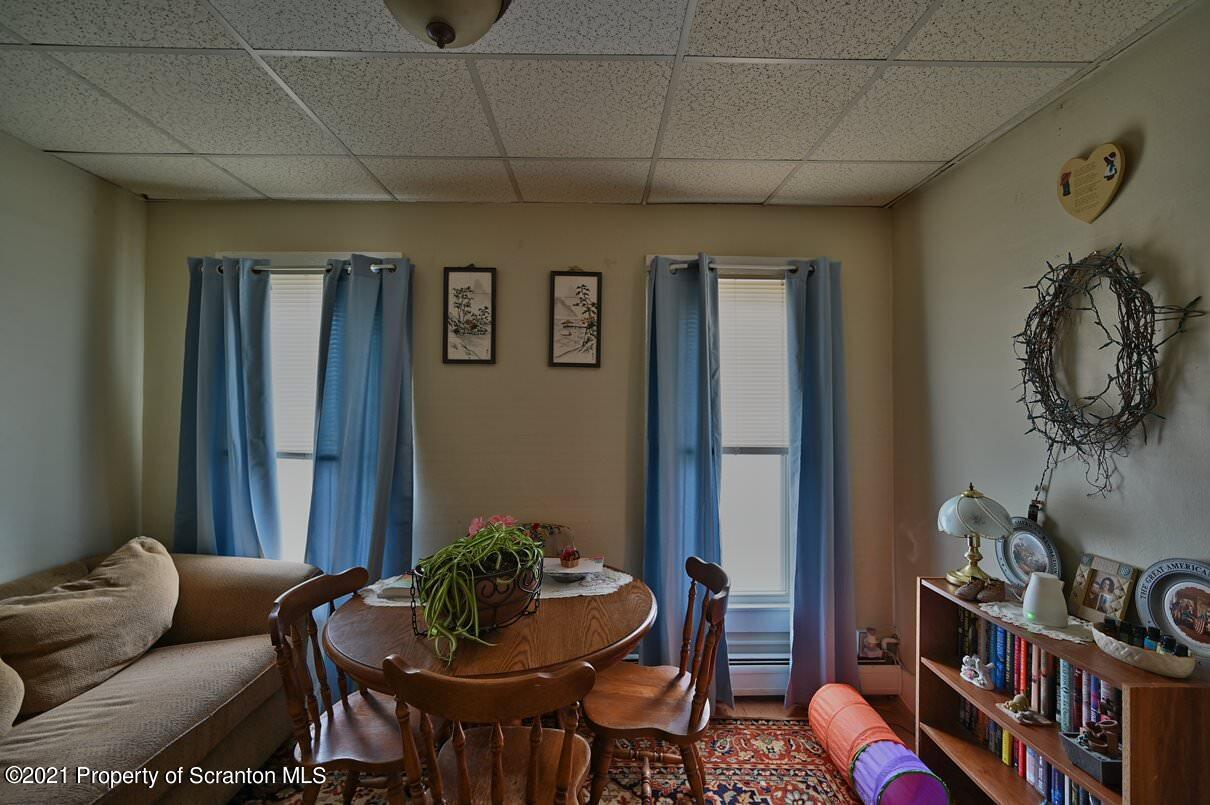 303 Main Street Nicholson, PA 18446 - Photo 86 of 98 a living room with furniture and a book shelf