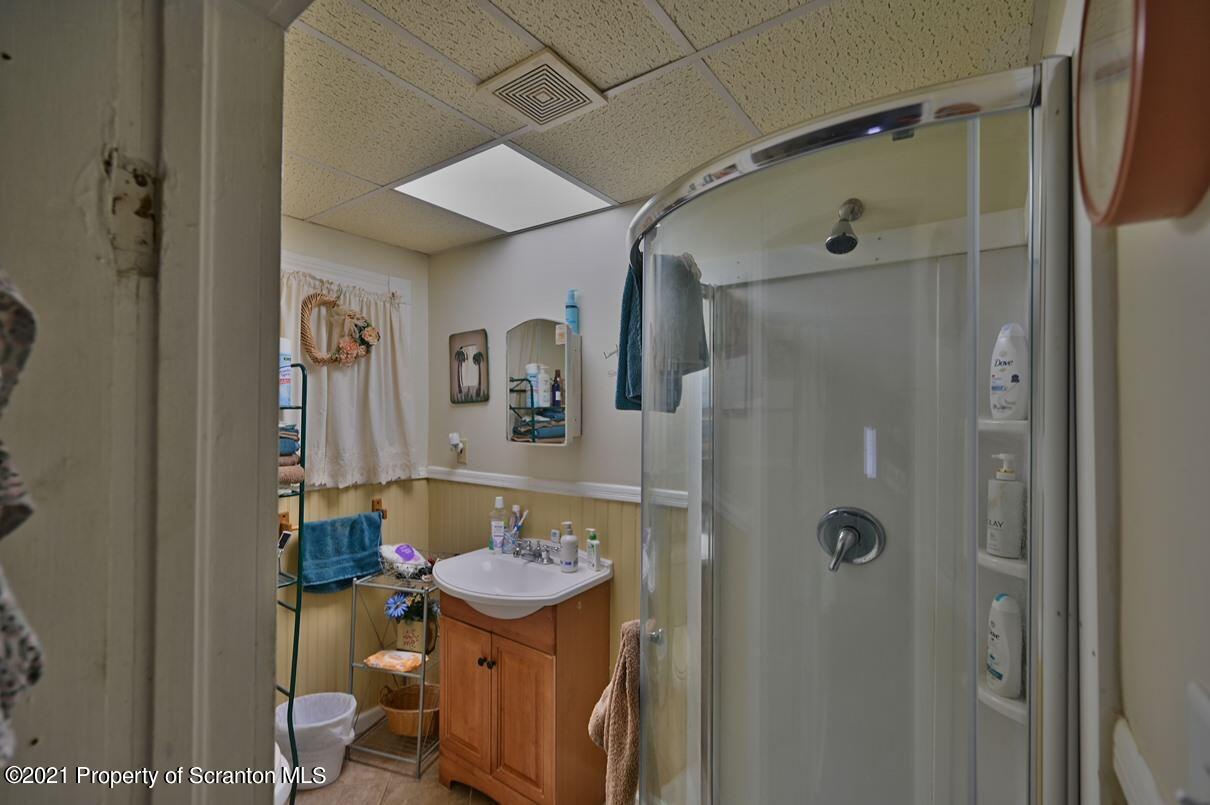 303 Main Street Nicholson, PA 18446 - Photo 93 of 98 a bathroom with a sink toilet and shower