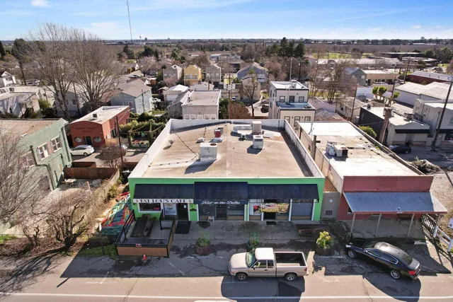 a front view of a house with garage