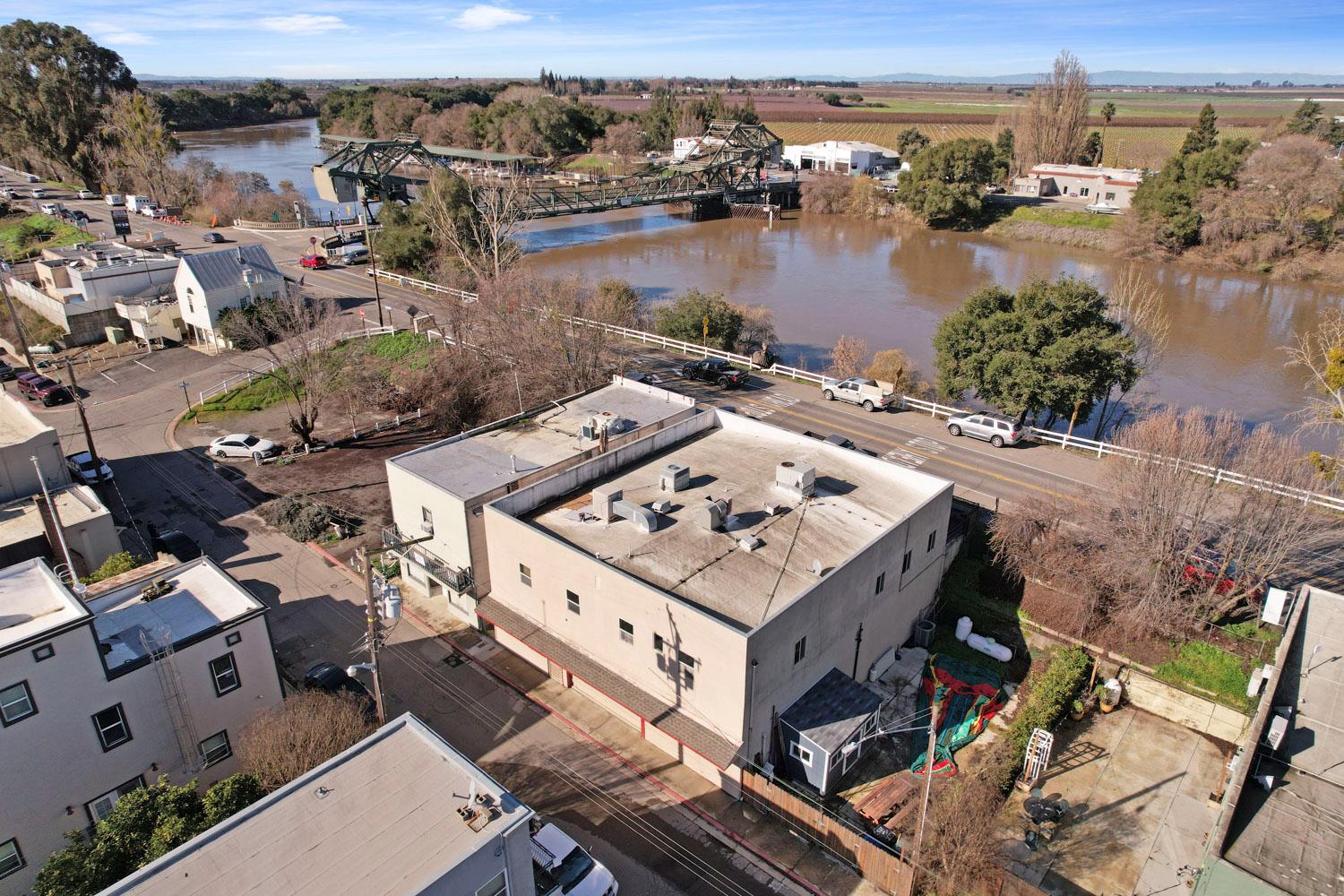 14144 Market Street Walnut Grove, CA 95690 - Photo 14 of 86 an aerial view of a house with outdoor space and lake view