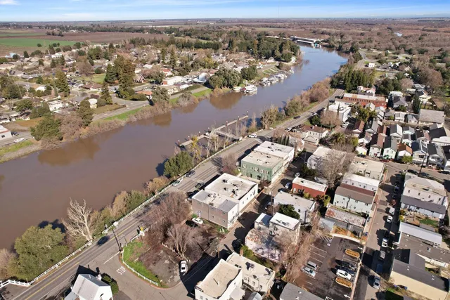 a view of gym with large trees