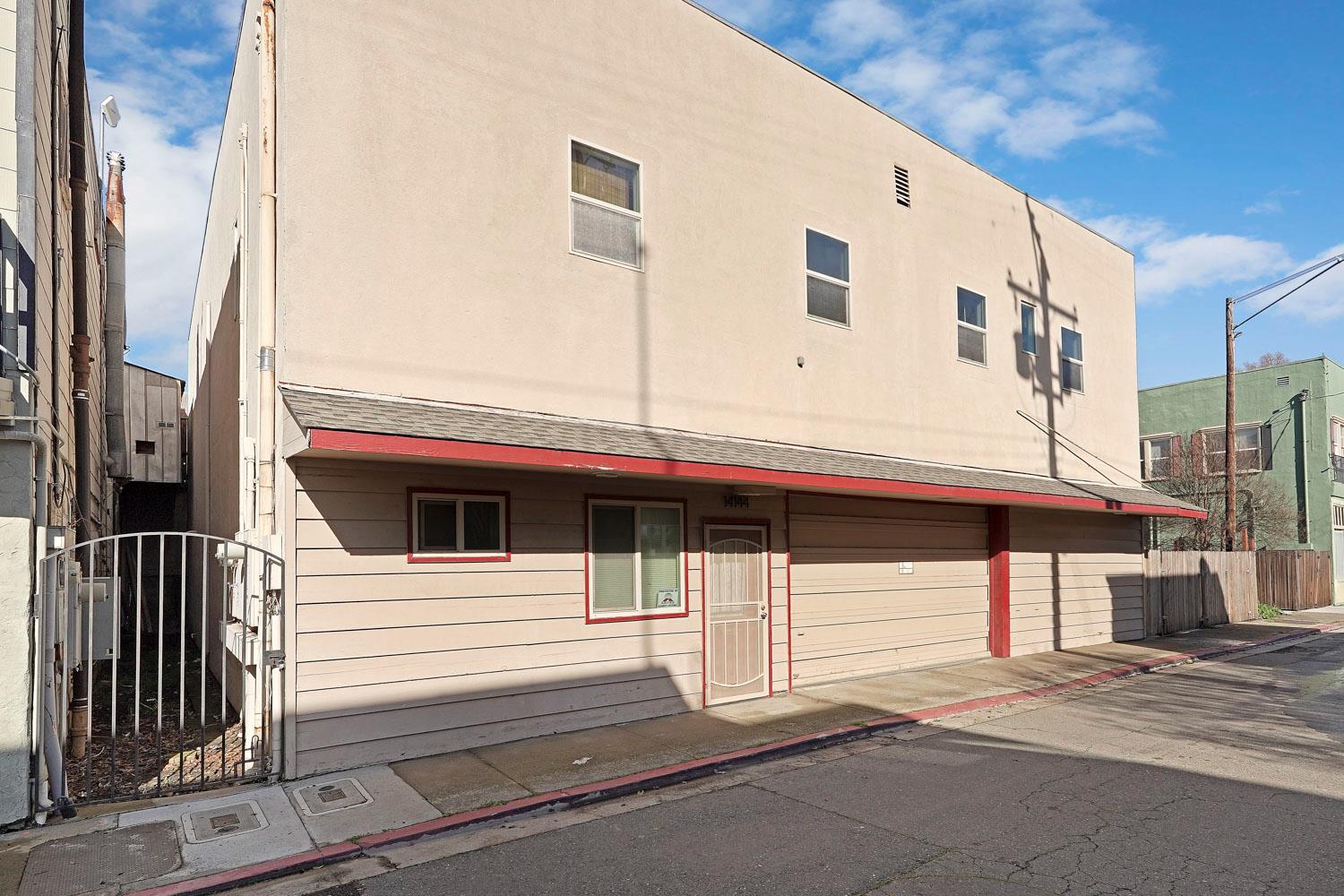 14144 Market Street Walnut Grove, CA 95690 - Photo 24 of 86 a front view of a house with garage
