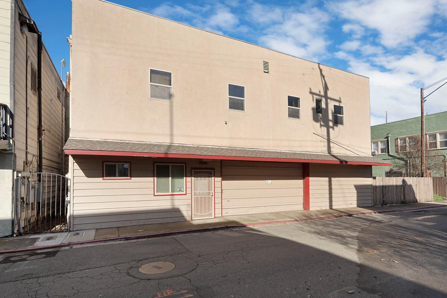 14144 Market Street Walnut Grove, CA 95690 - Photo 25 of 86 a front view of a house with garage