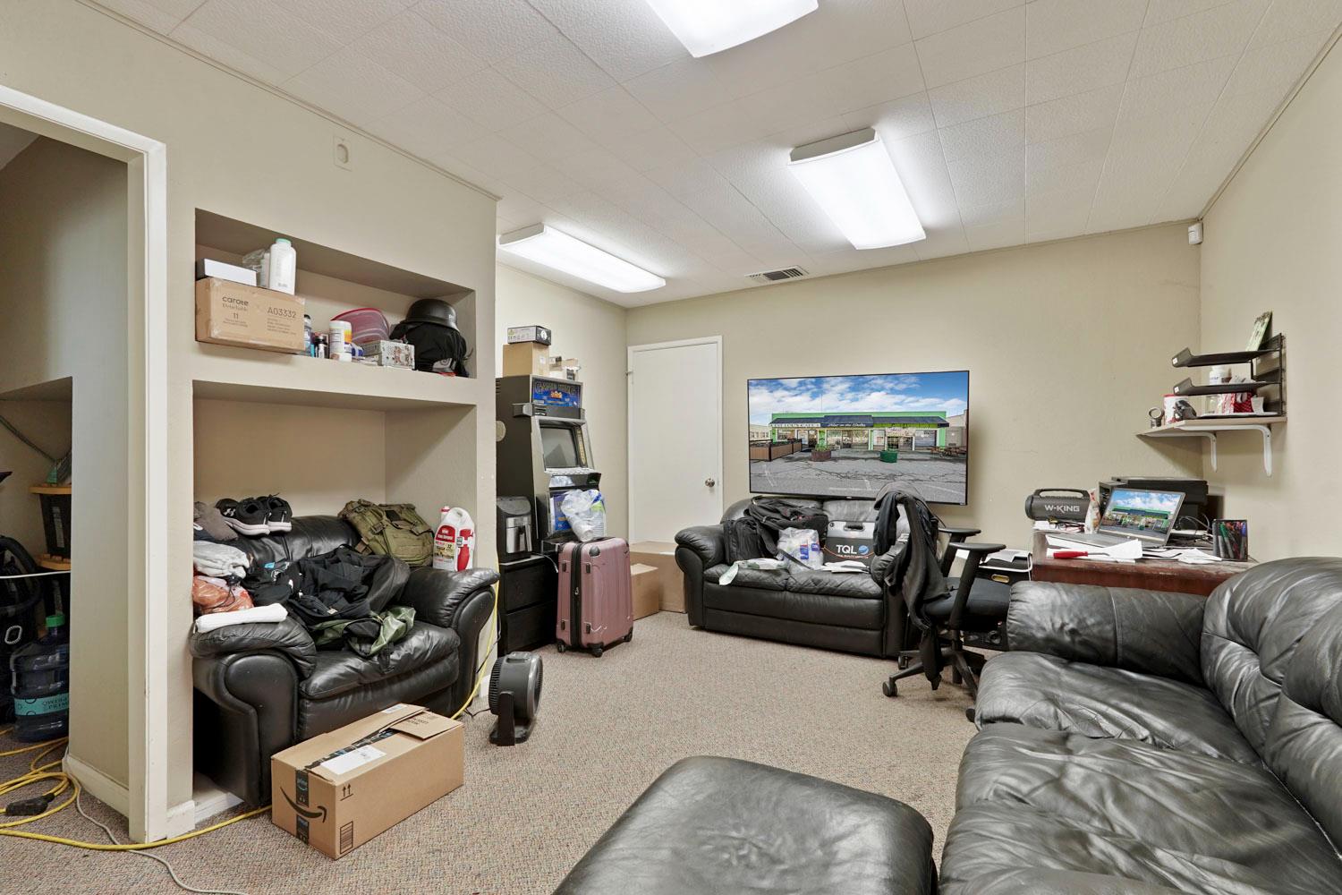 14144 Market Street Walnut Grove, CA 95690 - Photo 30 of 86 a living room with furniture and a window