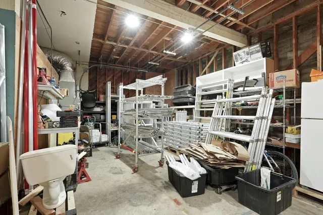 a room with gym equipment and a mirror