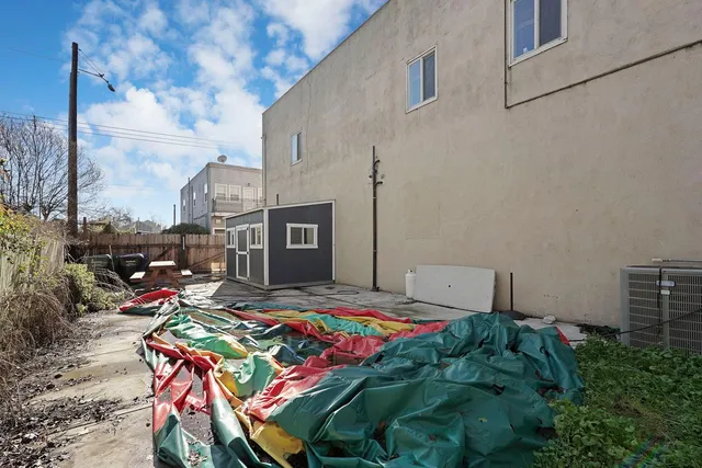 a bedroom with furniture a rug and a window