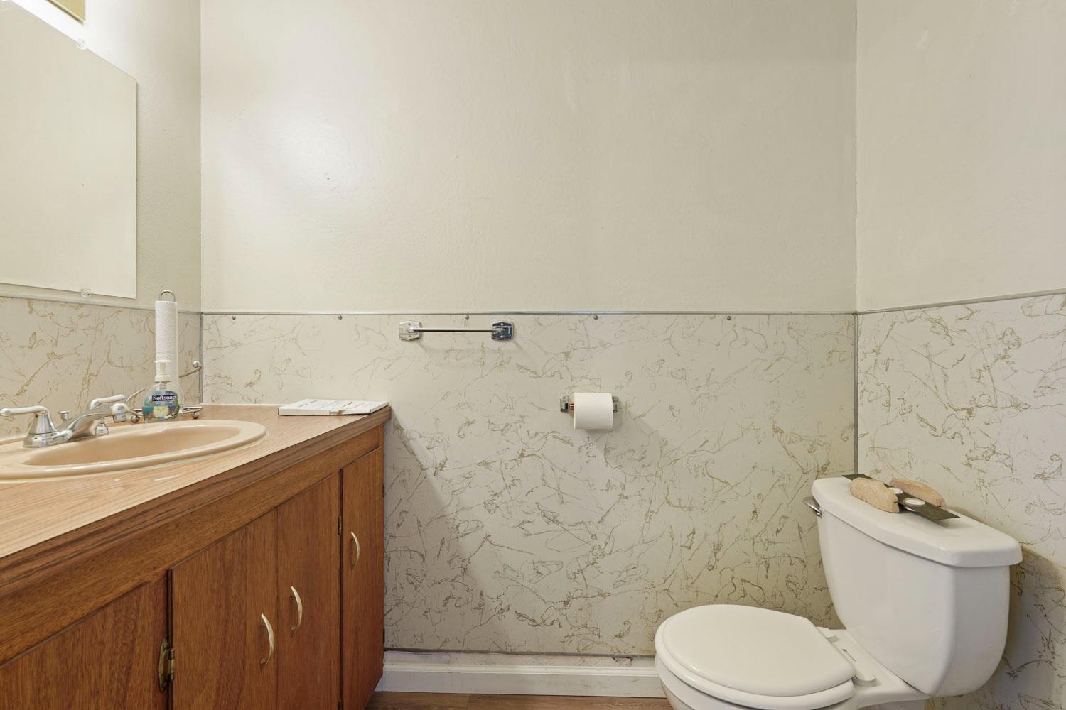 14144 Market Street Walnut Grove, CA 95690 - Photo 55 of 86 a bathroom with a sink a toilet and shower