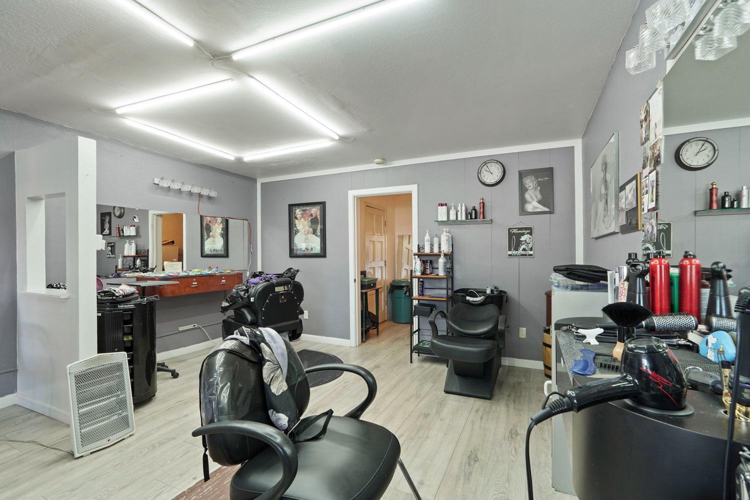 14144 Market Street Walnut Grove, CA 95690 - Photo 57 of 86 a room with gym equipment and a mirror