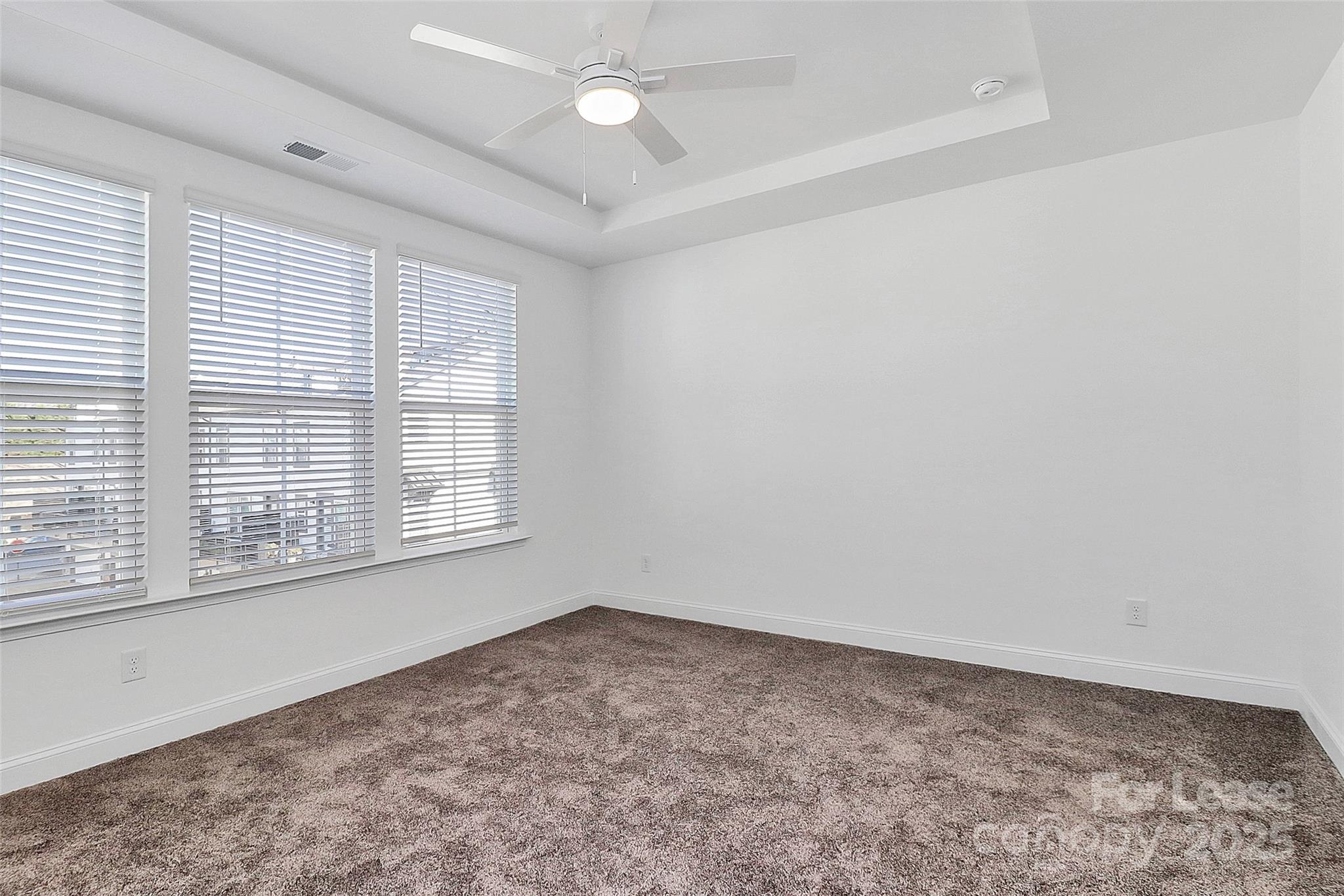 707 Hoke Lane Davidson, NC 28036 - Photo 14 of 27 an empty room with a window