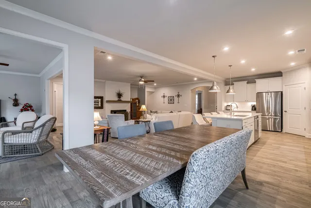 a bedroom with a large bed and a tv