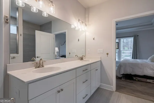 a bathroom with a toilet a sink and a bathtub