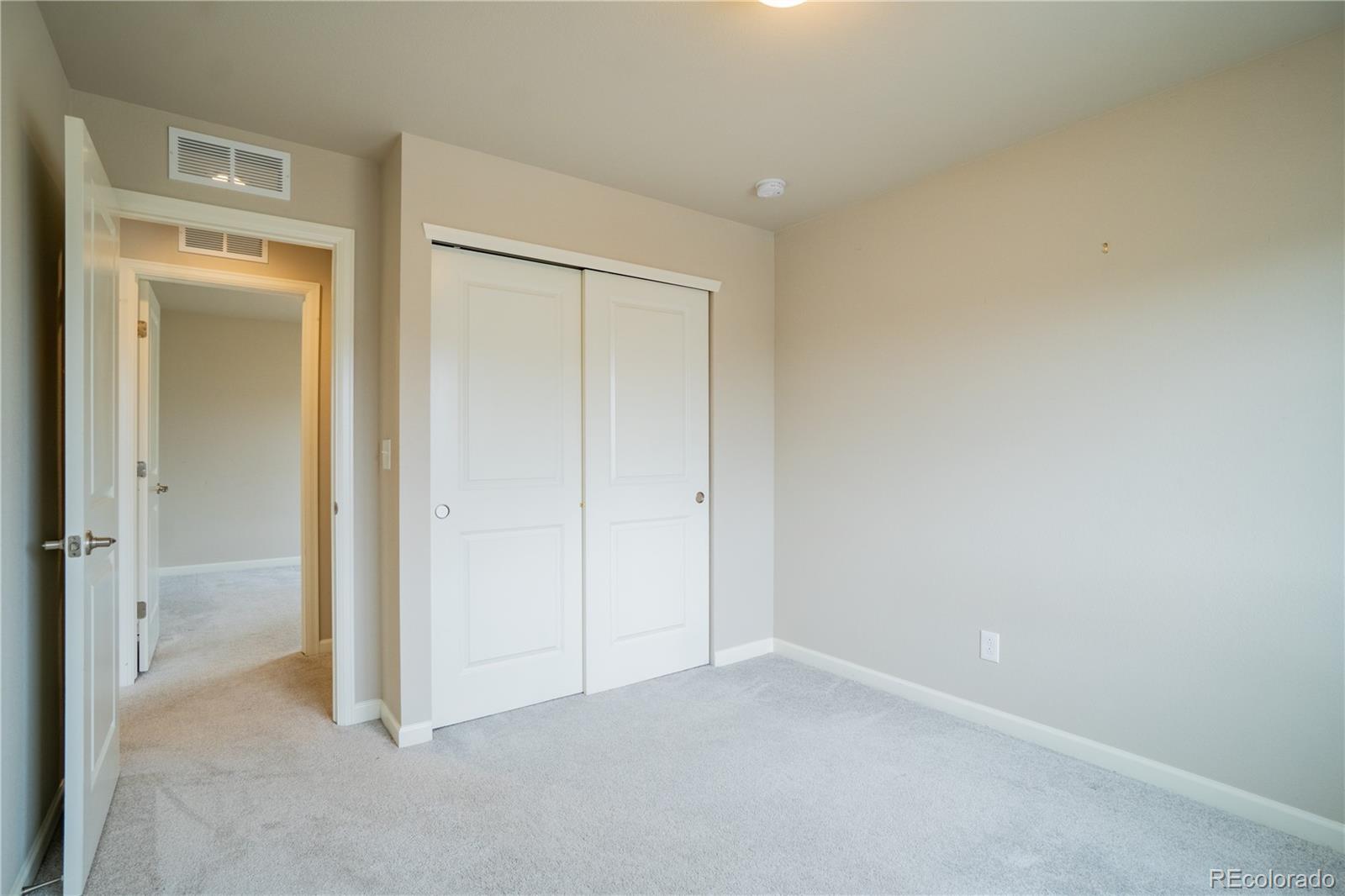643 Ranchhand Drive Berthoud, CO 80513 - Photo 24 of 39 an empty room with closet area