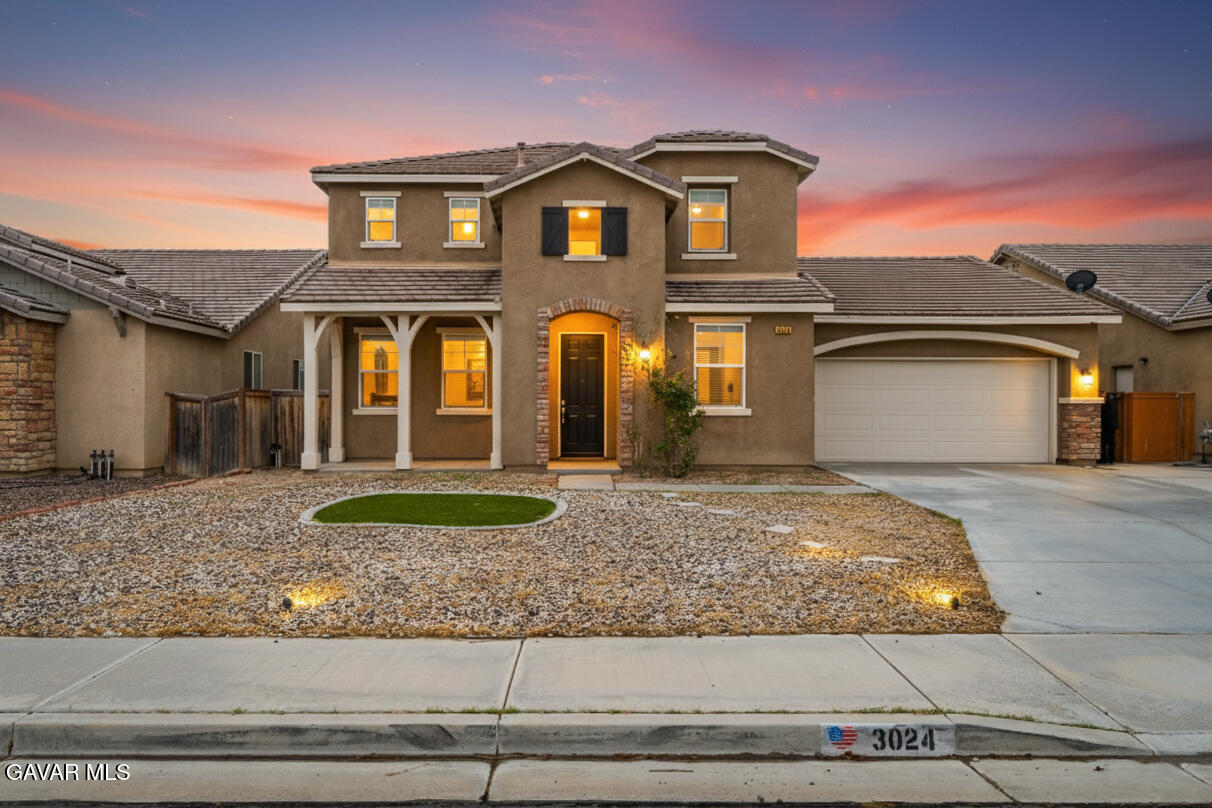 3024 Erica Avenue Rosamond, CA 93560 - Photo 1 of 32 a front view of a house