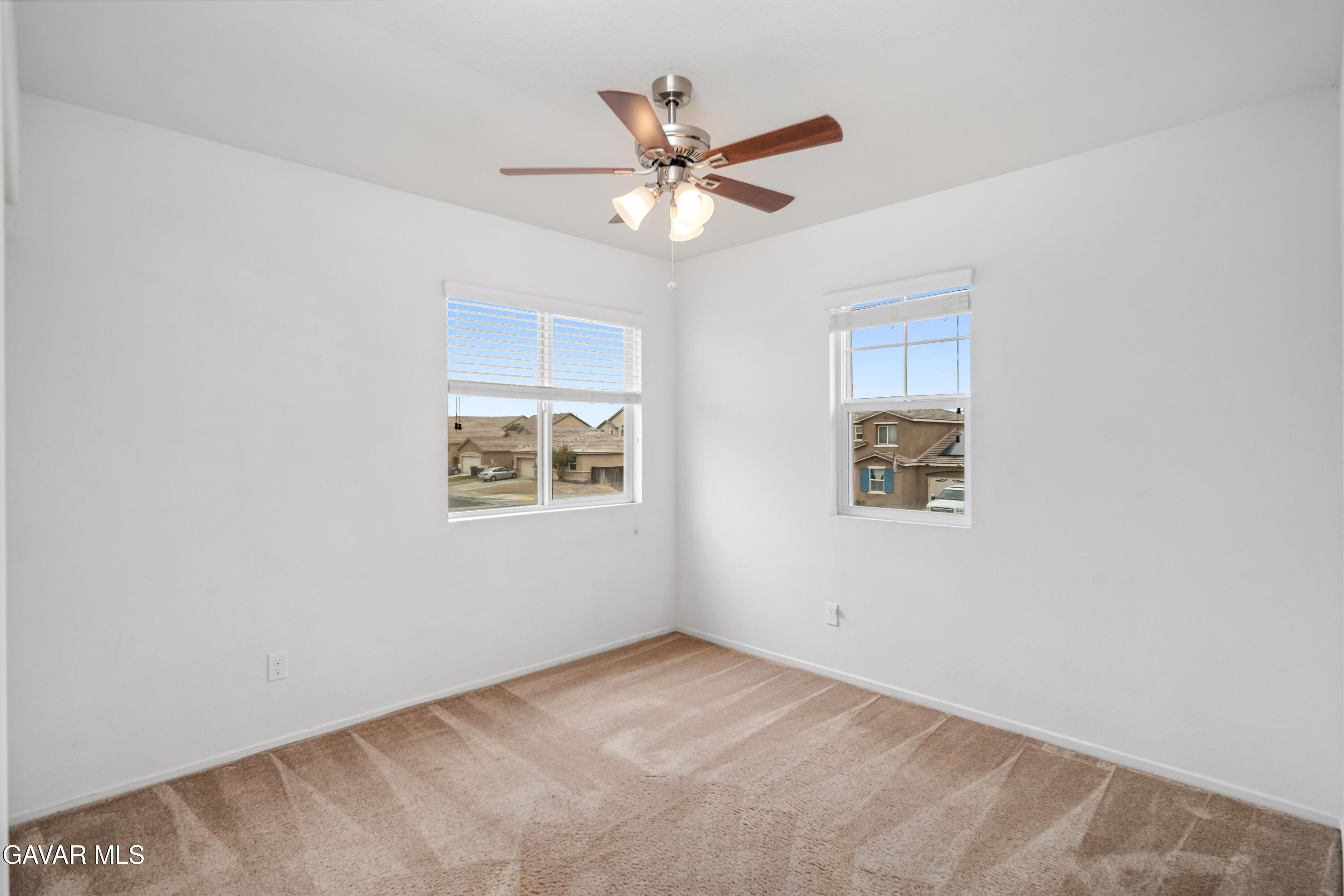 3024 Erica Avenue Rosamond, CA 93560 - Photo 25 of 32 a view of an empty room with a window