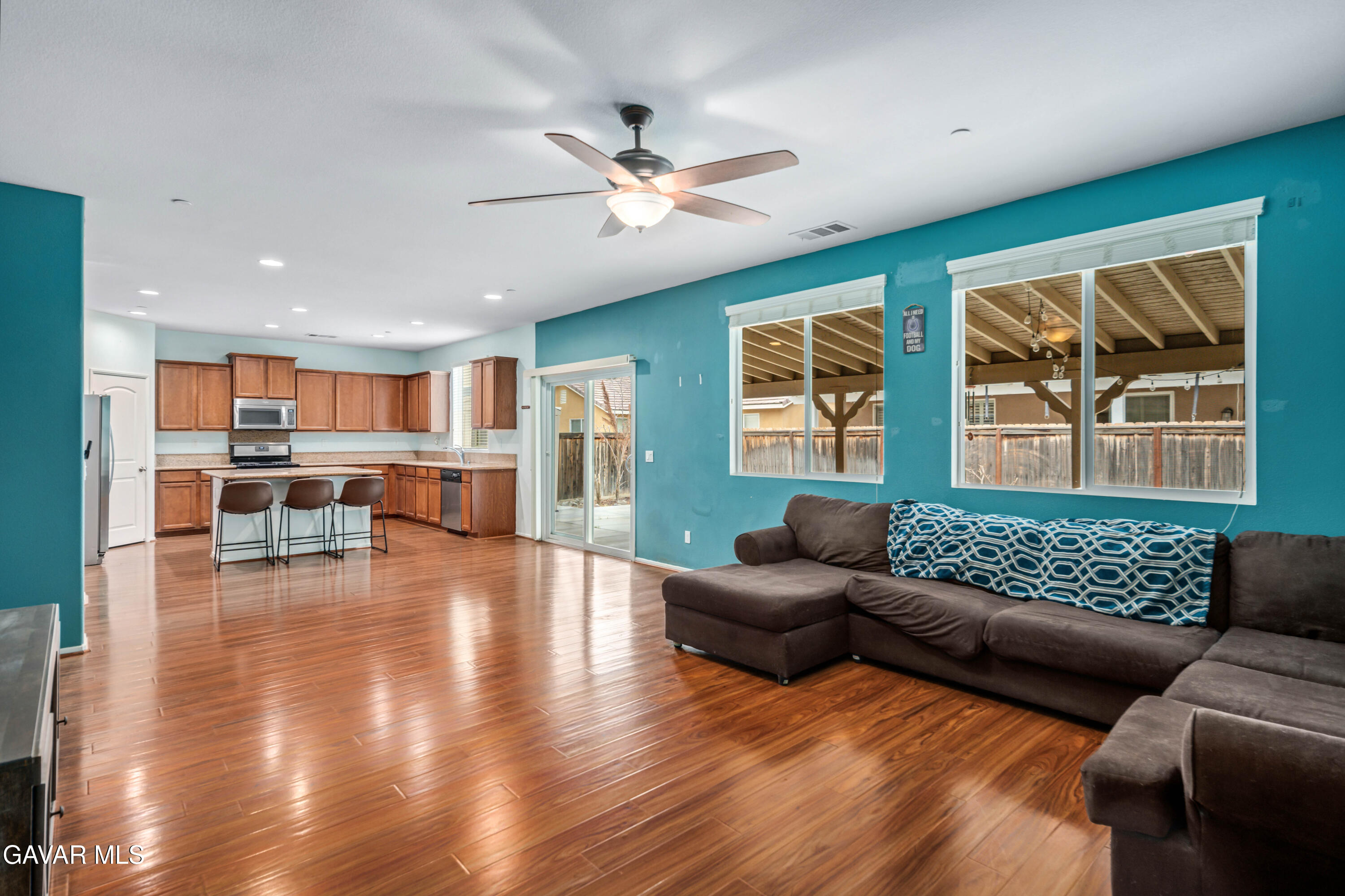 3024 Erica Avenue Rosamond, CA 93560 - Photo 7 of 32 a living room with furniture and a large window