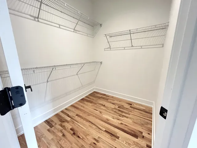 a view of a room with racks on the wall