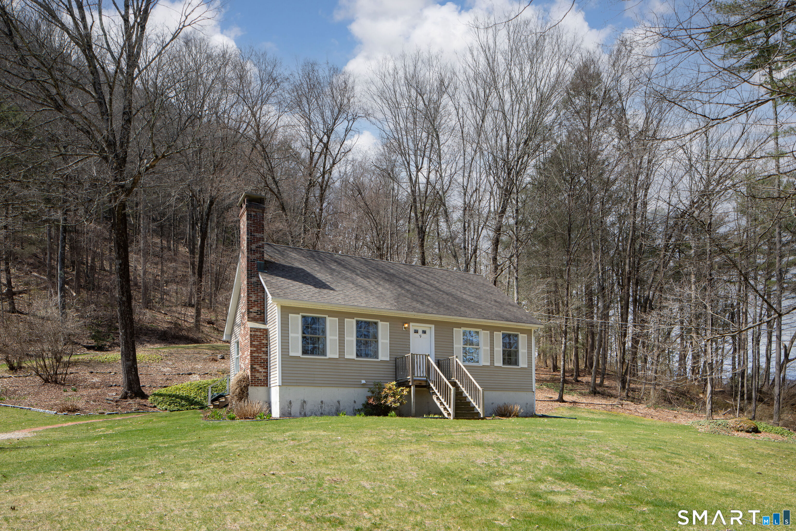9 Prospect Mountain Road Salisbury, CT 06068 - Photo 1 of 15 a front view of a house with a yard