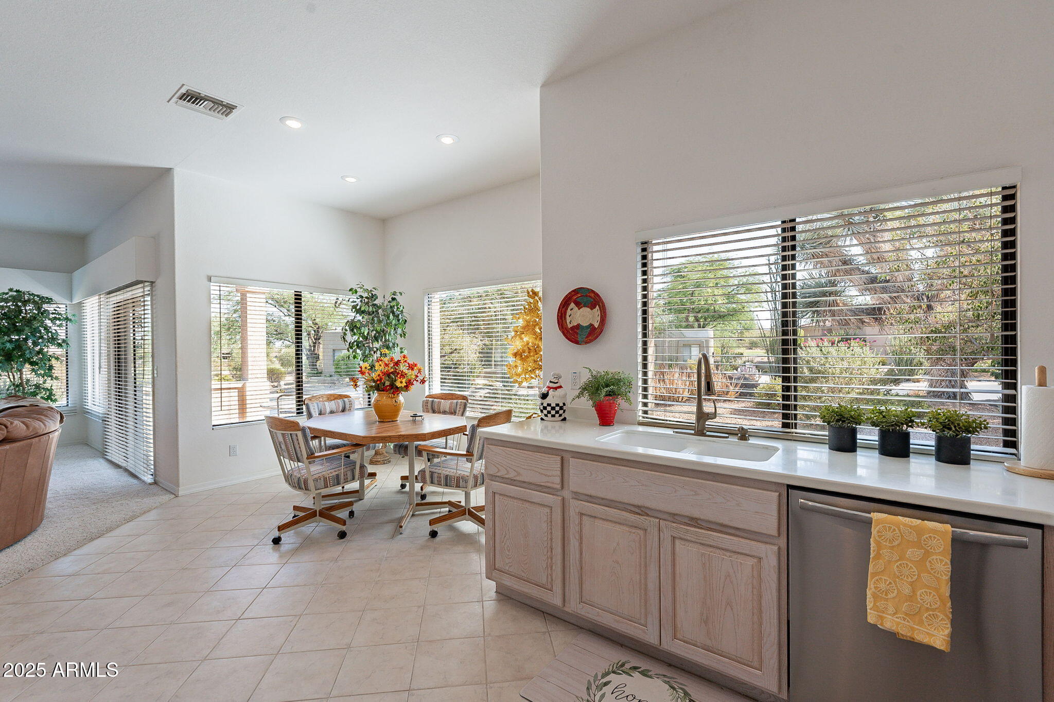 18637 Amarado Circle Rio Verde, AZ 85263 - Photo 13 of 51 a view of a kitchen with dining table and chairs