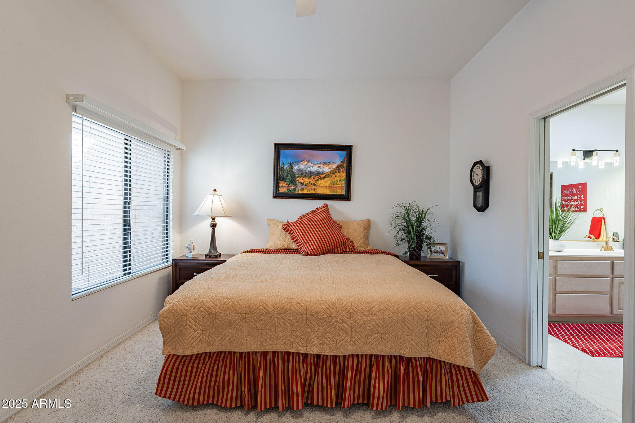 18637 Amarado Circle Rio Verde, AZ 85263 - Photo 16 of 51 a bedroom with a bed and a painting on the wall