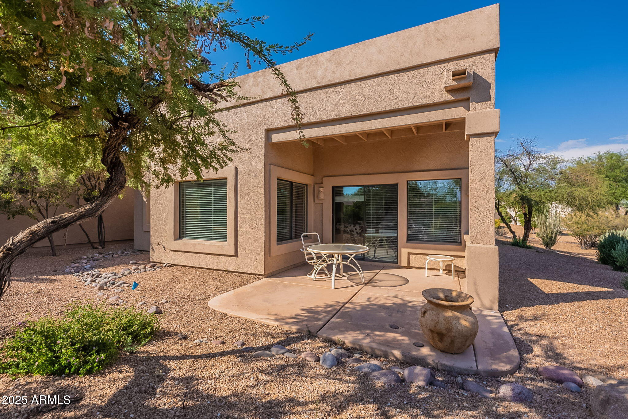 18637 Amarado Circle Rio Verde, AZ 85263 - Photo 30 of 51 a view of a backyard with sitting area and porch