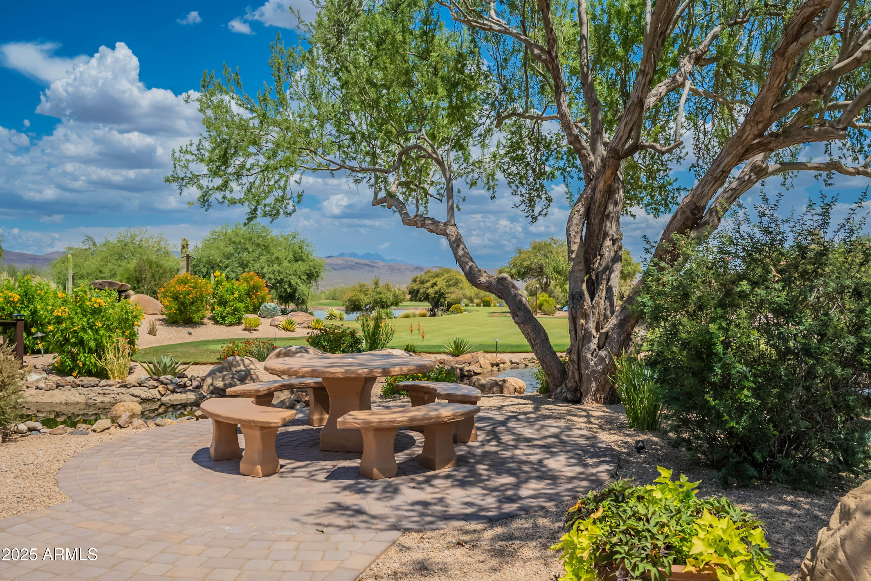 18637 Amarado Circle Rio Verde, AZ 85263 - Photo 36 of 51 a view of a fire pit with large trees