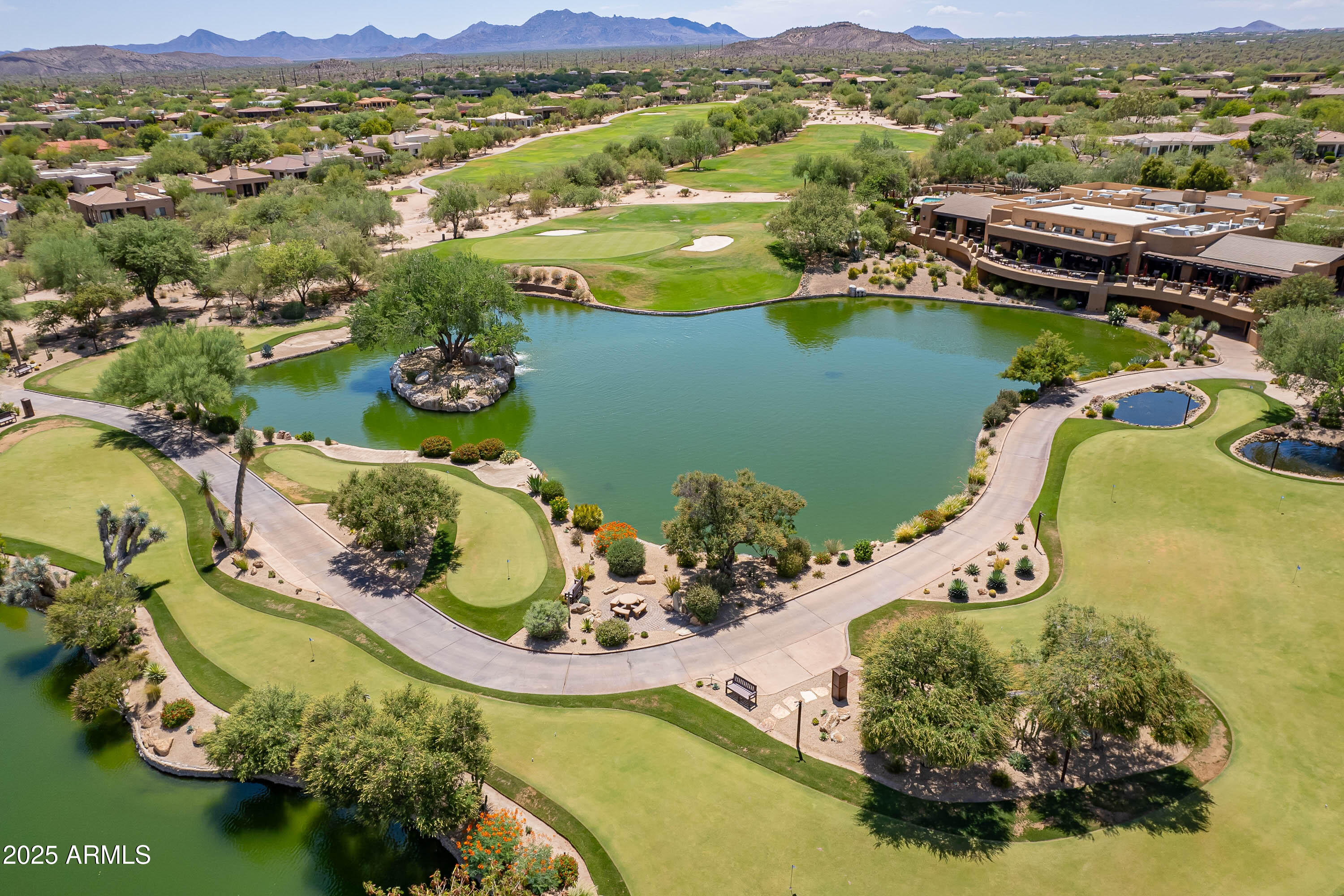 18637 Amarado Circle Rio Verde, AZ 85263 - Photo 48 of 51 an aerial view of a house with a lake view