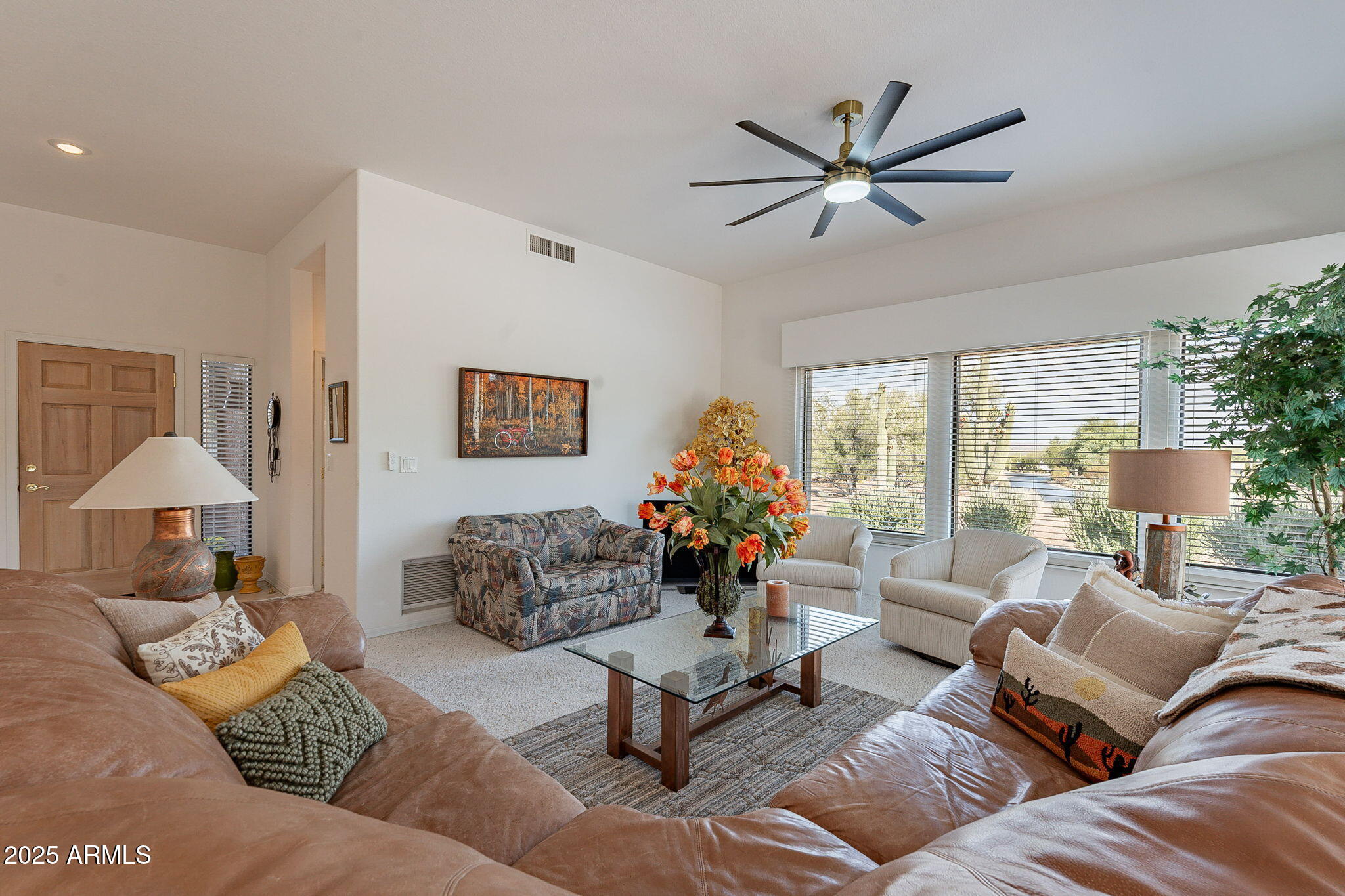 18637 Amarado Circle Rio Verde, AZ 85263 - Photo 5 of 51 a living room with furniture and a large window