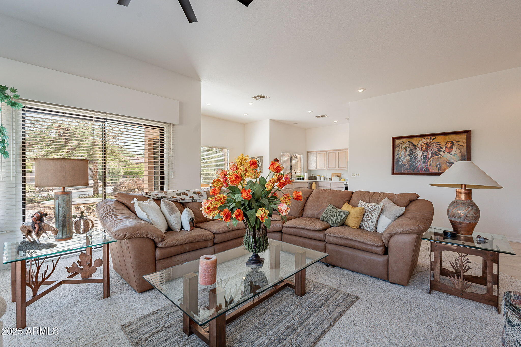 18637 Amarado Circle Rio Verde, AZ 85263 - Photo 9 of 51 a living room with furniture or couch and a potted plant