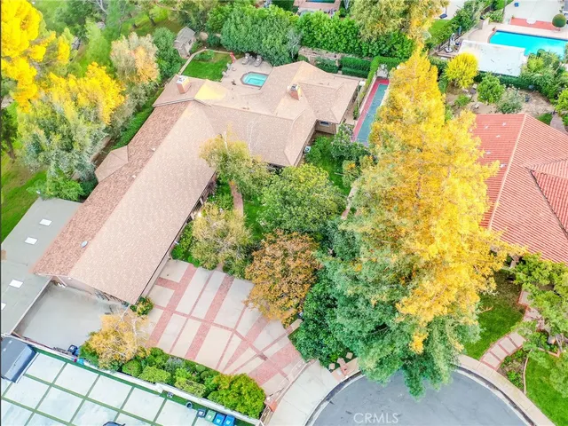 an aerial view of residential house with an outdoor space