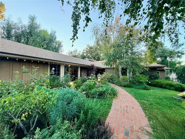 a view of a house with garden