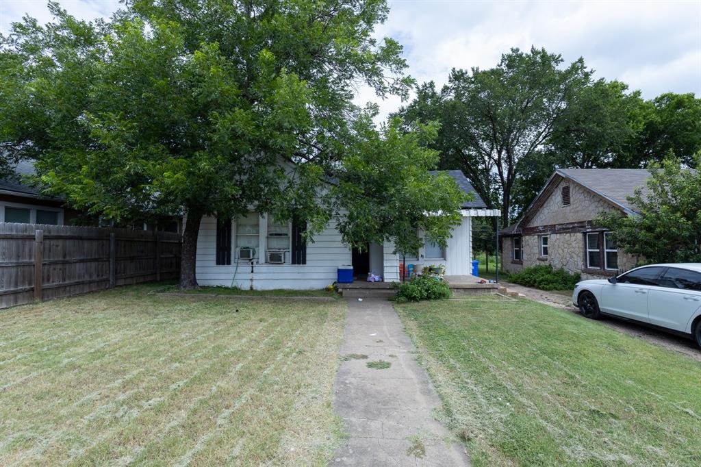 2913 Homan Avenue, Unit 2913 Waco, TX 76707 - Photo 1 of 16 Front exterior with white siding and dark window shutters