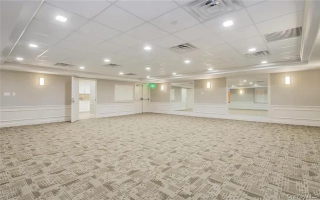 a view of a hallway with an empty room