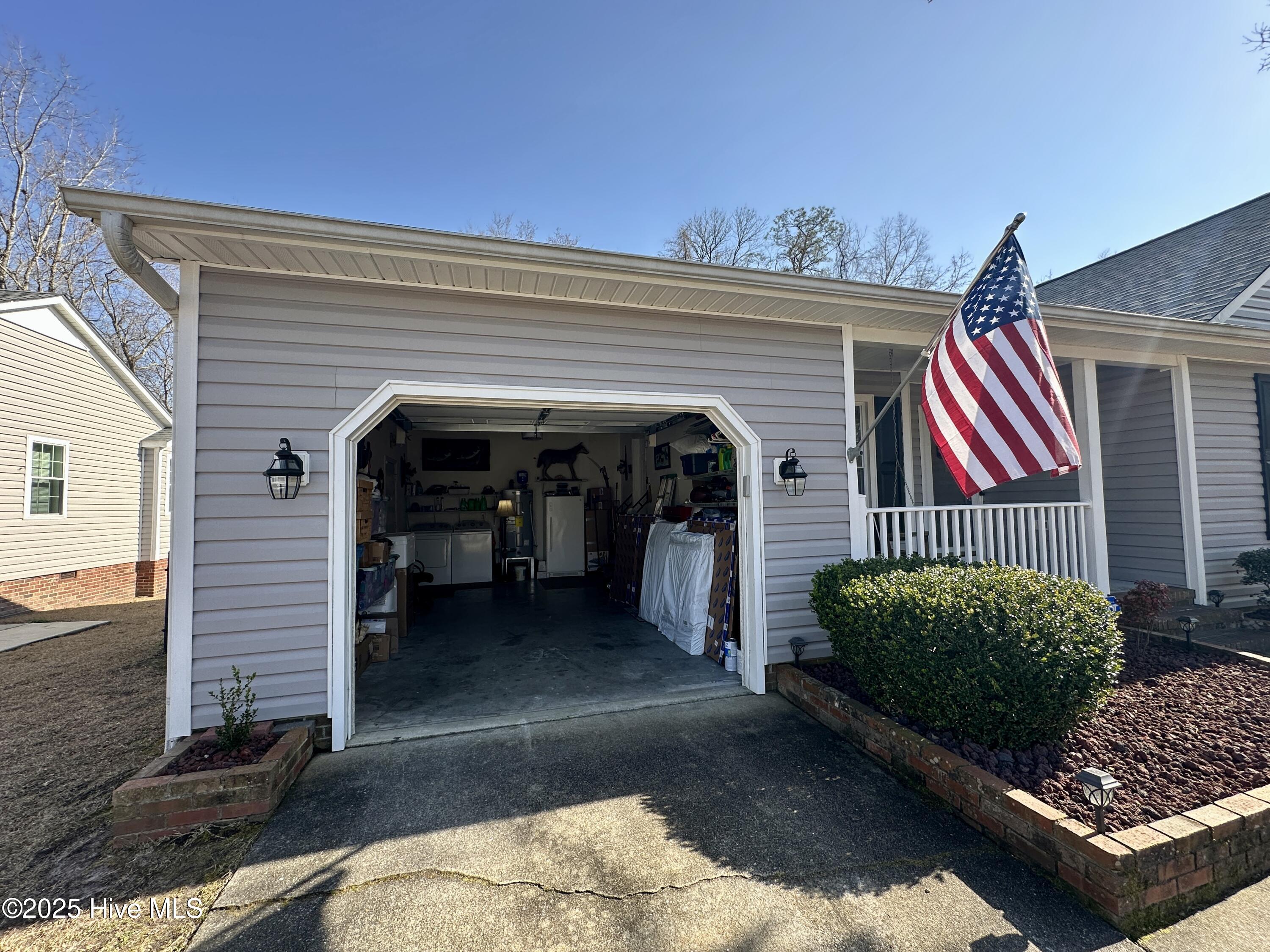 166 Raintree Circle Jacksonville, NC 28540 - Photo 48 of 57 166RaintreeCir_garagefront