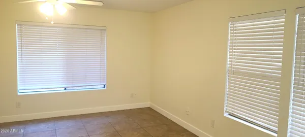 a view of a room that has a window in it