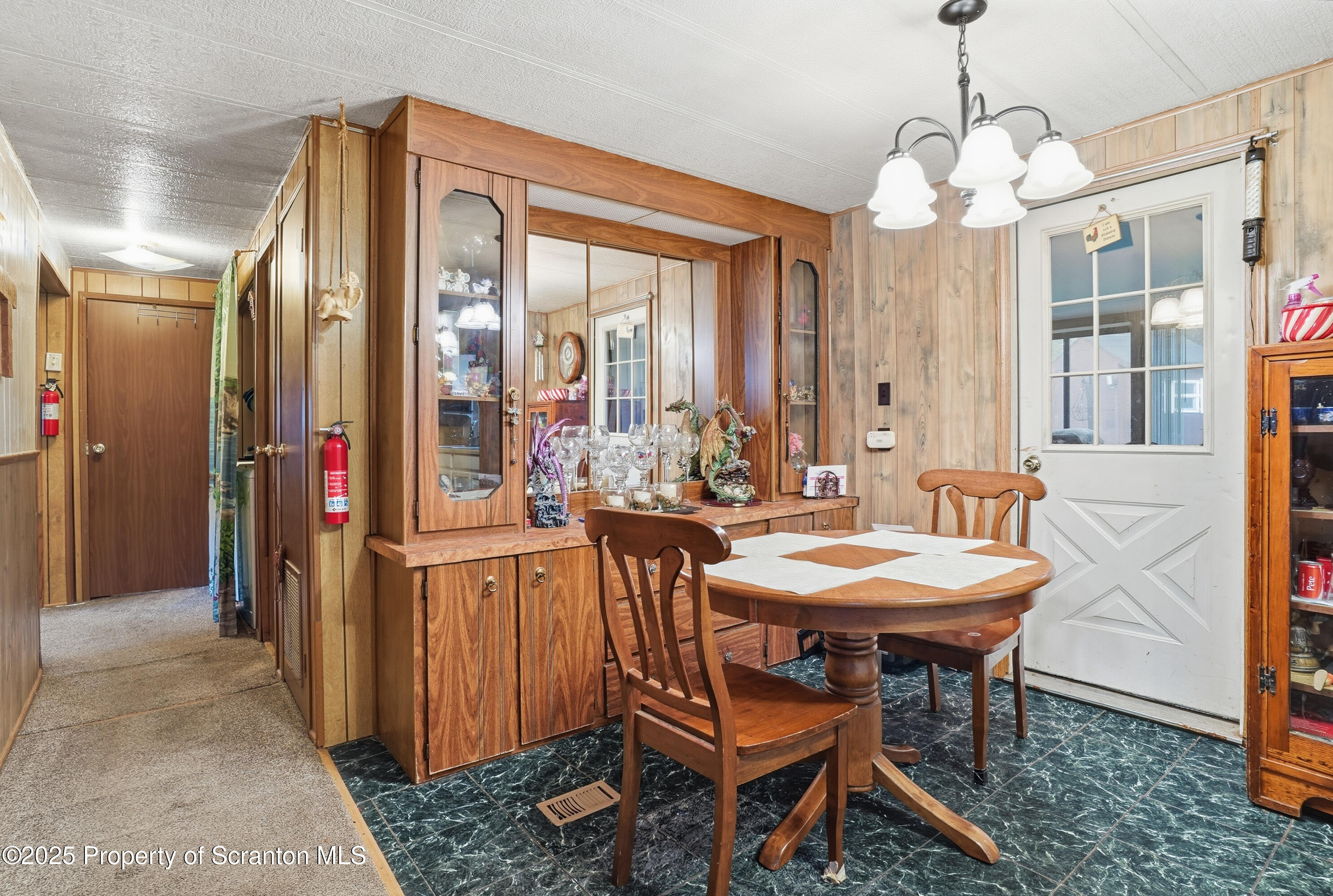 4794 Highway 706 Wyalusing, PA 18853 - Photo 14 of 40 a view of a dining room with furniture and chandelier