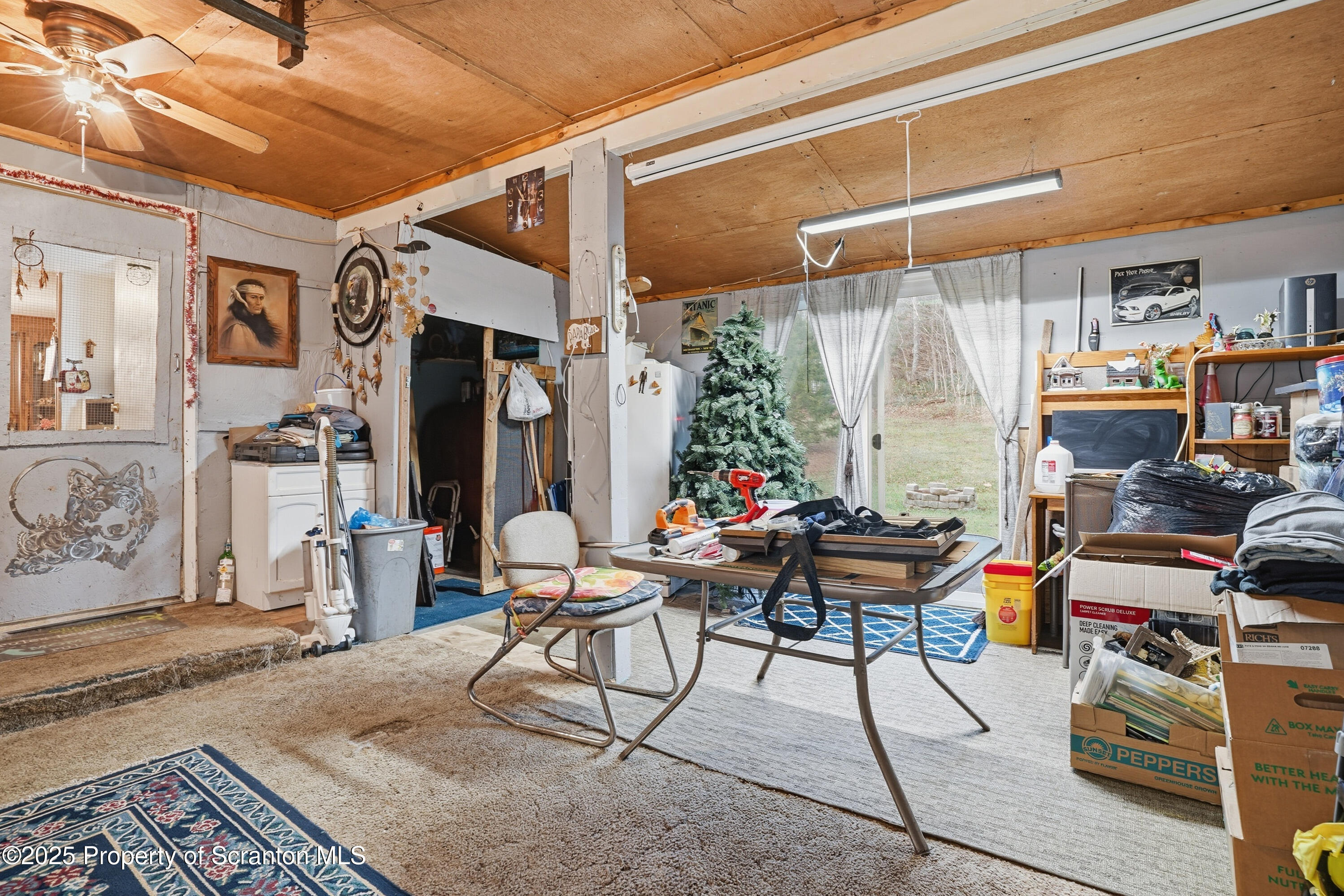 4794 Highway 706 Wyalusing, PA 18853 - Photo 26 of 40 a work room with furniture and a window