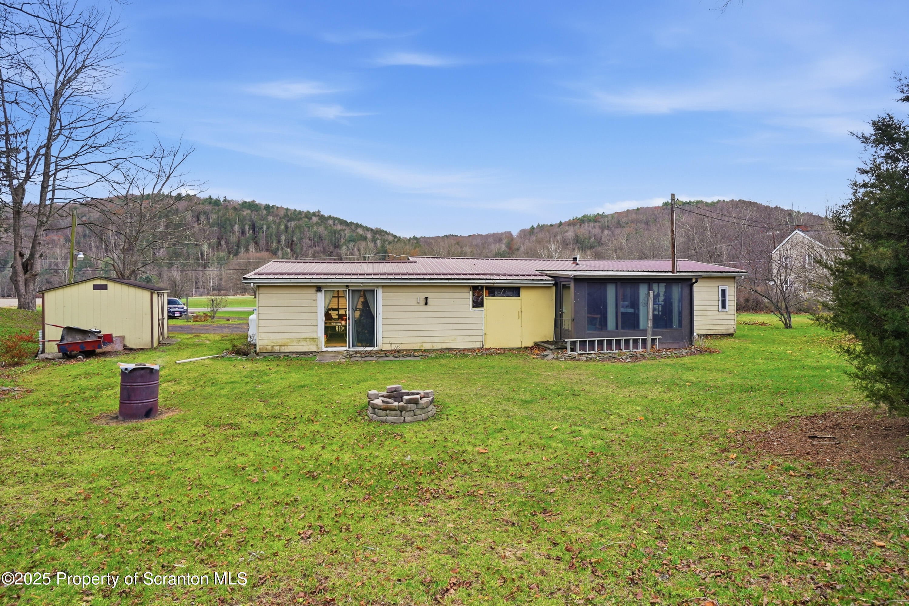 4794 Highway 706 Wyalusing, PA 18853 - Photo 31 of 40 a view of a house with a back yard