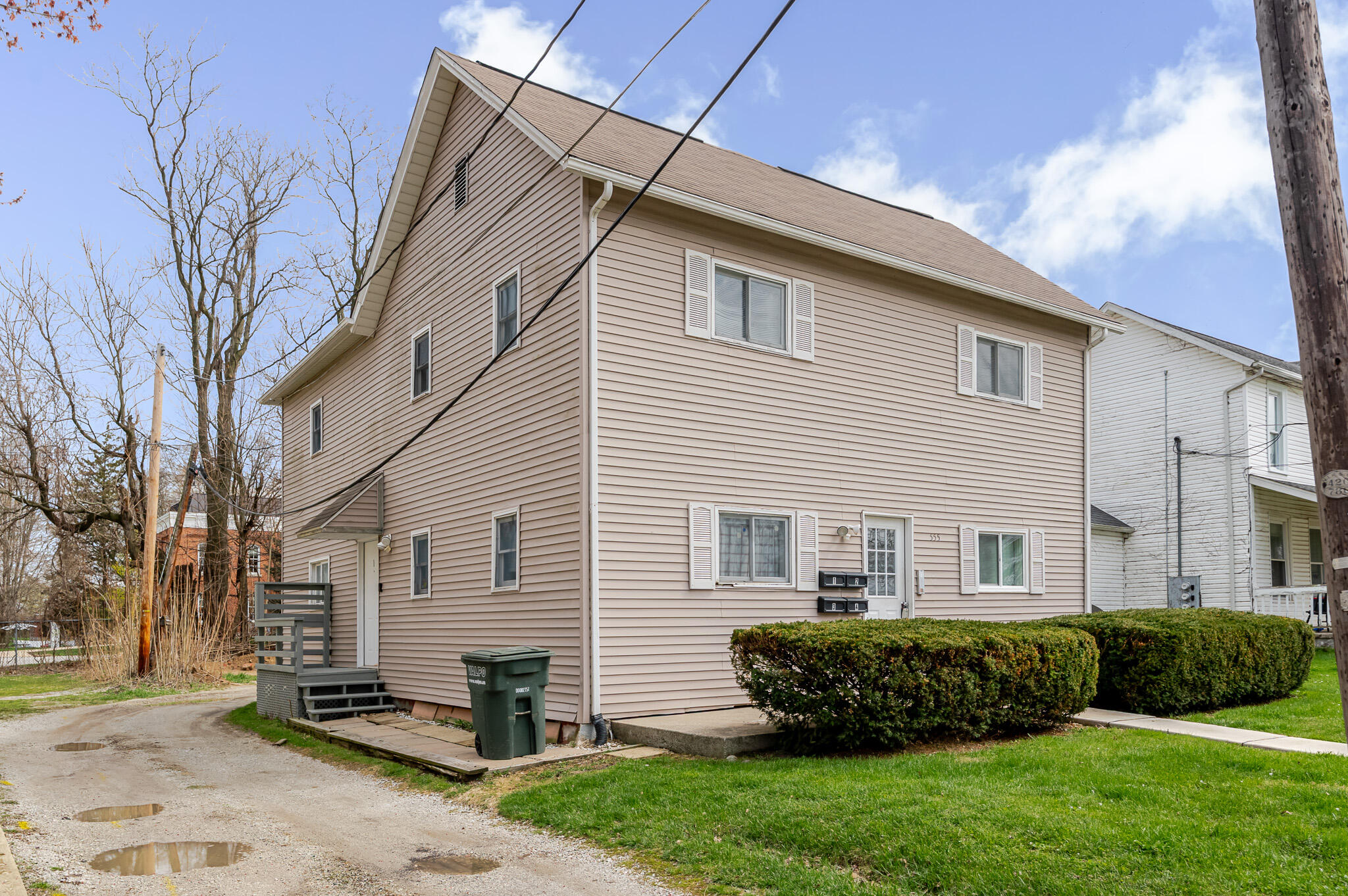 555 South Locust Street, Unit 2 Valparaiso, IN 46383 - Photo 8 of 8 a front view of a house with a yard