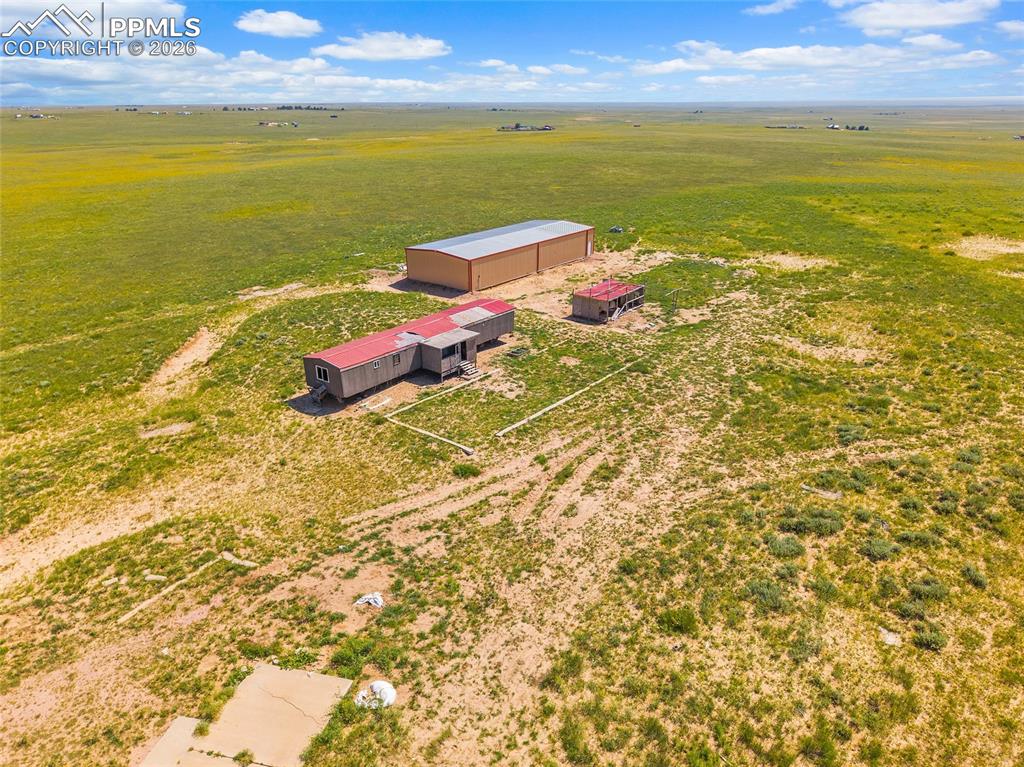 12595 Dan View Yoder, CO 80864 - Photo 6 of 22 a view of an ocean and a nearby beach