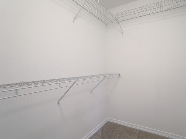 6330 Possum Ridge Road Crestview, FL 32539 - Photo 18 of 22 a view of small space with racks on the wall