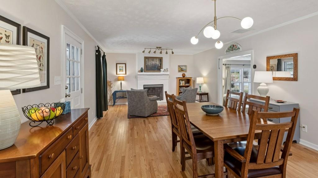 3972 North Peachtree Road Atlanta, GA 30341 - Photo 12 of 28 a view of a dining room with furniture and wooden floor