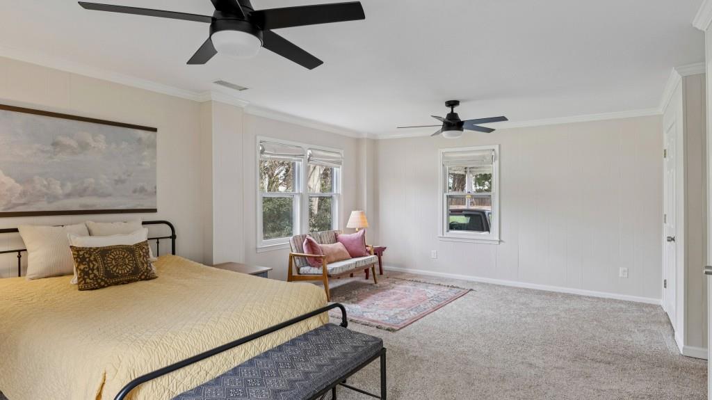 3972 North Peachtree Road Atlanta, GA 30341 - Photo 19 of 28 a bedroom with a bed and wooden floor