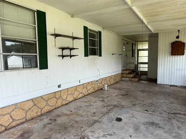 a water heater on a table next to a window