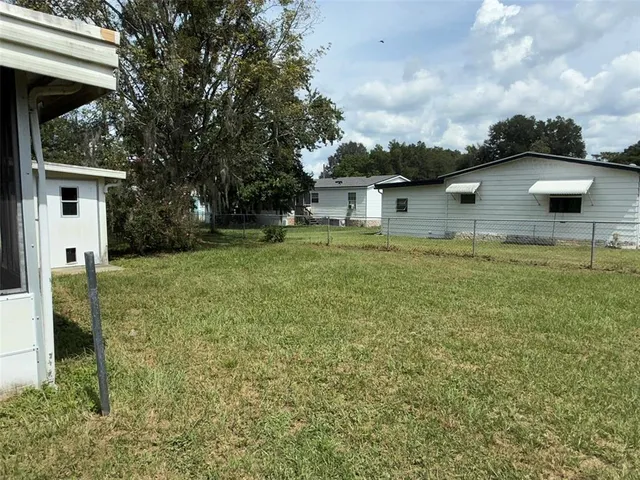 a house with trees in the background